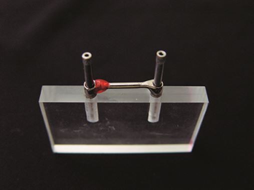Distribuição das tensões geradas por implantes interconectados com barra dolder, após solda a laser
